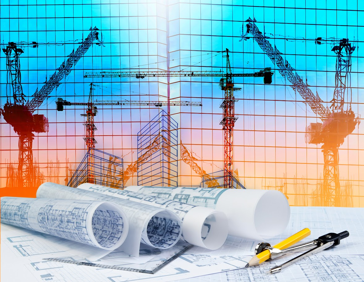 Construction planning with cranes, blueprints and drawing tools