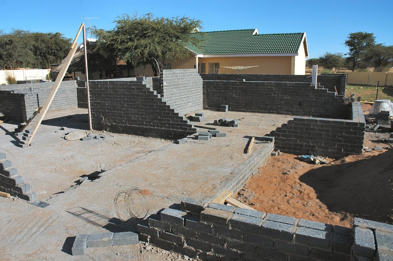 Building foundation and masonry walls under construction