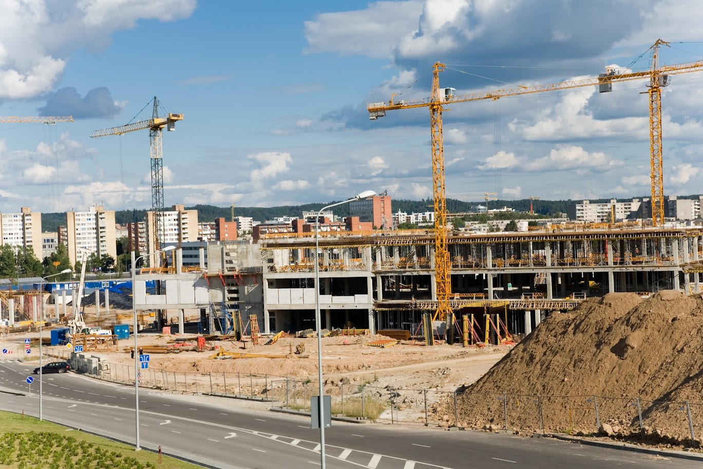 Large active construction site with cranes
